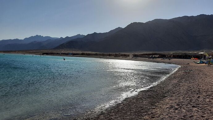 Turquoise water at Dahab’s Blue Lagoon, framed by the rugged Sinai mountains